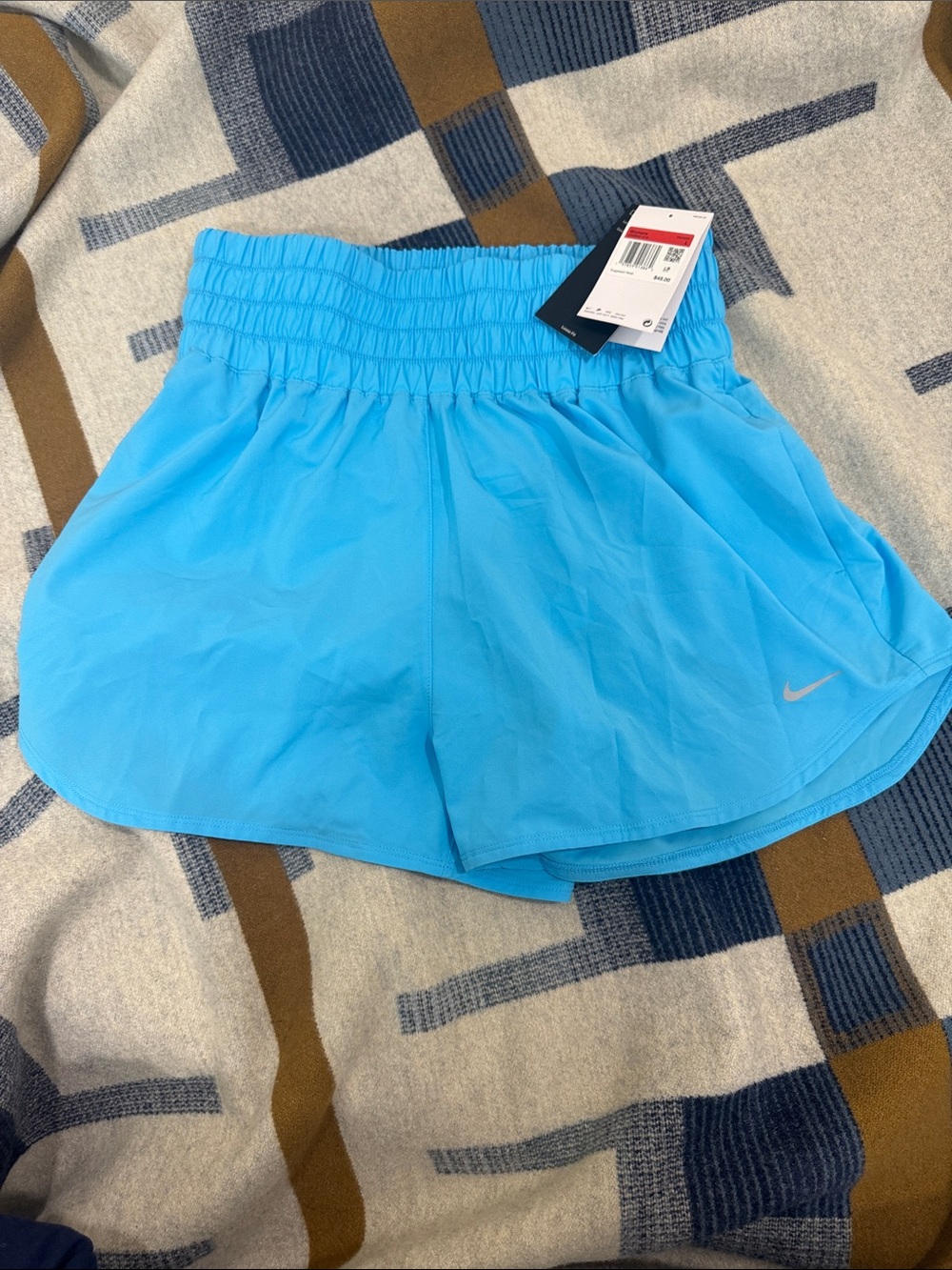 Nike Women's Sky Blue Athletic Shorts with Swoosh